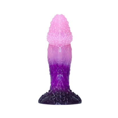 Purple and pink silicone textured dildo on a white background